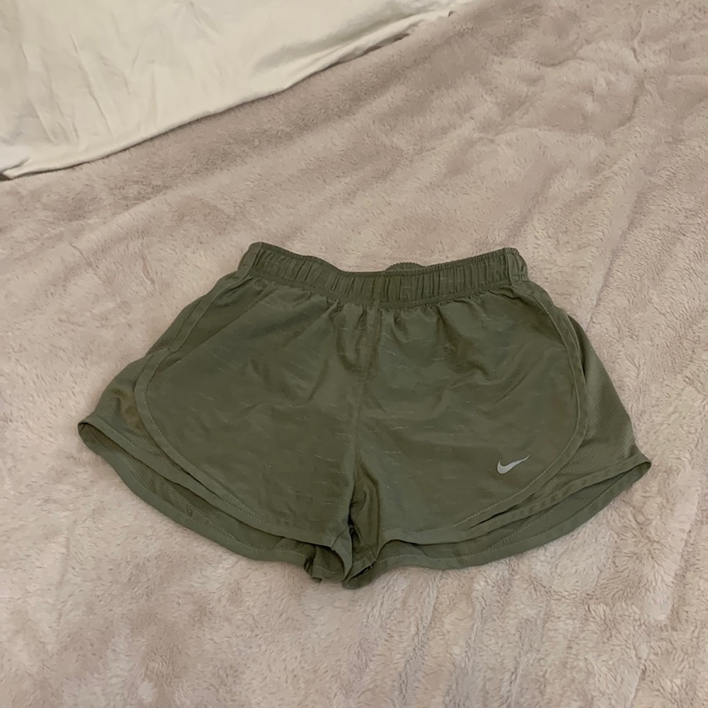 Light army green dri-fit Nike shorts with inside liner and adjustable waistband.